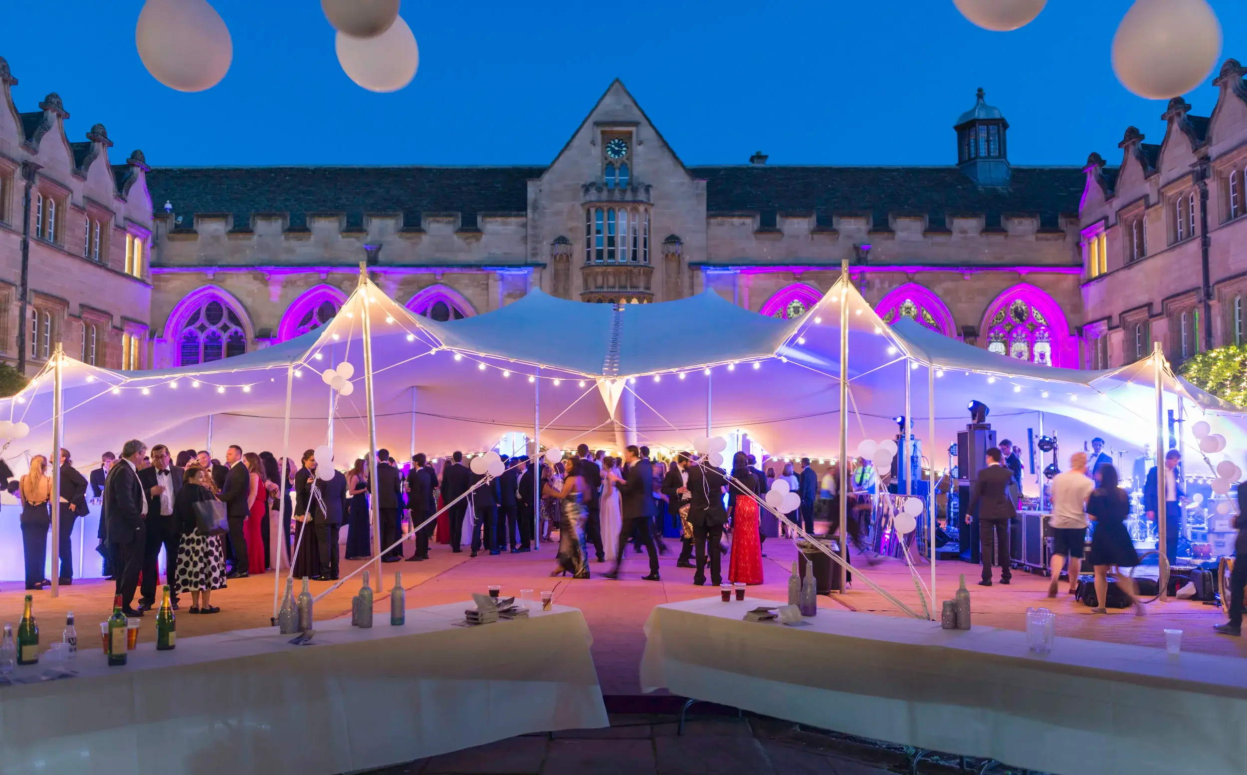 Stretch tent lit up for an evening party - stretch tent hire Oxfordshire